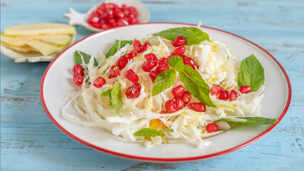 Cabbage Pomegranate Salad for Jewish holiday Rosh Hashanah.