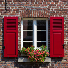 Old German house with window with wooden shutters, Wachtendonk - 676688946