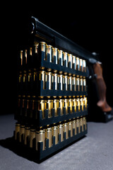 Elegant Semiautomatic 9mm Handgun Leaning on Bullet Ammunition in Switzerland.