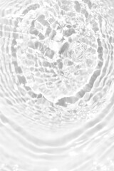 Defocus blurred transparent white colored clear calm water surface texture with splashes reflection. Trendy abstract nature background. Water waves in sunlight with copy space. Blue watercolor shine.