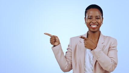 Woman, portrait and pointing for announcement in studio with smile, presentation or advertising...