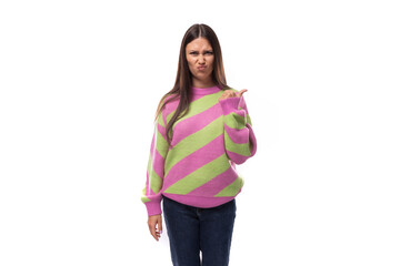 pretty 35 year old feminine model woman dressed in a pink stylish pullover announces the news...