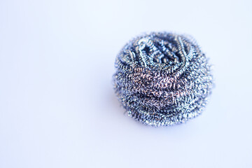 Stainless steel wool scrubbers for scrubbing pots, isolated on white background. Concept, kitchen cleaning tool. Utensil. Household.    