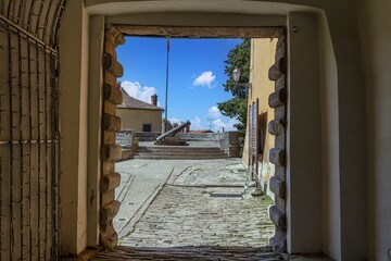 View through a gate to the round bastion of the ancient Croatian town of Labin