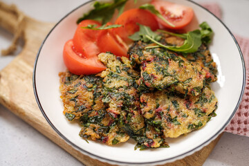 Green pancakes from beet tops. Healthy vegan food concept. Keto diet.
