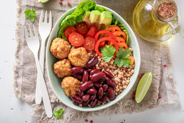 Energetic Mexican salad with meat, vegetables and groats.