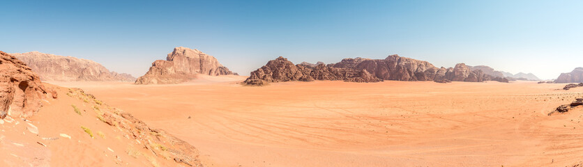 Fototapeta na wymiar Panoramic view at the Wadi Rum desert rock formation in Jordan