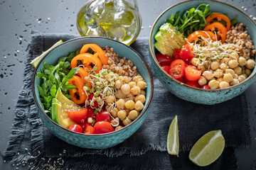 Fresh salad with groats, vegetables and chickpeas.