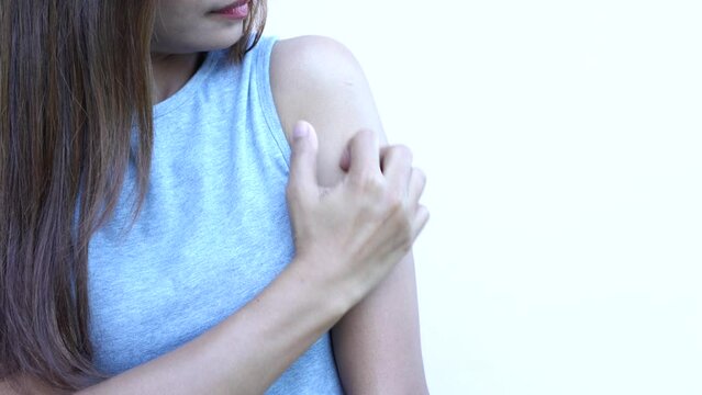Asian woman has itching on her hands and arms.