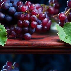 Grapes on a red wooden table and dark-blue background. Close up macro view.    - obrazy, fototapety, plakaty