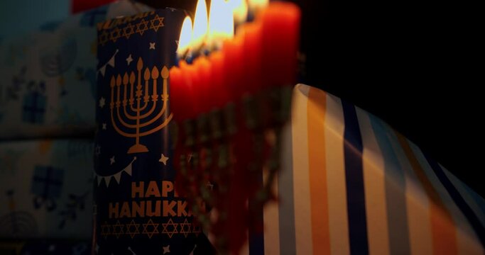Hanukkah Table Set Decoration in the dark with Menorah and wraped up gifts