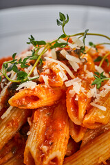 Close-up of pasta with a little cheese and oregano