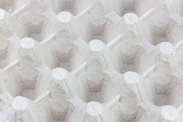 Empty egg carton box, closeup of photo, texture background