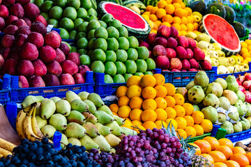 Variety of fresh fruits put out on sale on the street stall