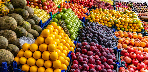 Variety of fresh fruits put out on sale on the street stall