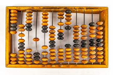 Purchased (consumer) antique wooden abacus close-up on a white background