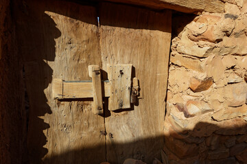 Wooden door and its lock in the desert town of Chinguetti, Adrar region, Mauritania. Chinguetti is...