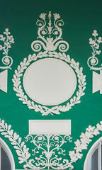 The pattern on the building. An old decoration. Architectural detail