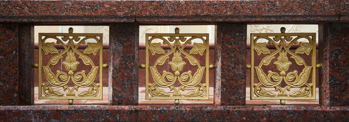 The pattern on the building. An old decoration. Architectural detail