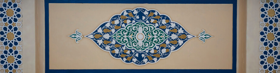 The pattern on the building. An old decoration. Architectural detail