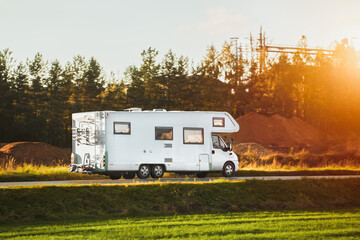 RV motorhome camper van on the highway with bike rack. Travel vacation adventure. Tourists in...