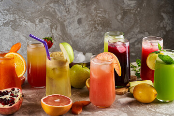 An image of a group of various cups of various fresh natural juices