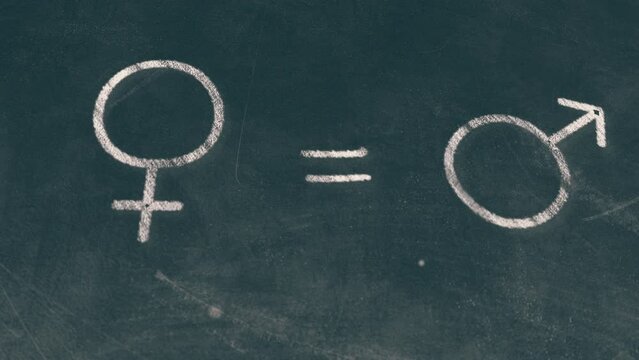 Gender equality hand written on a school board 