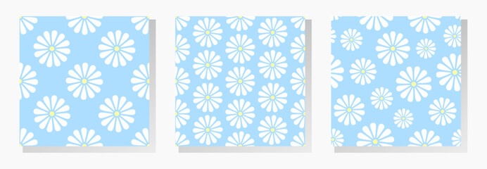White chamomiles flowers on blue background. Floral vector seamless patterns collection. Best for textile, wallpapers, wrapping paper, package and home decoration.