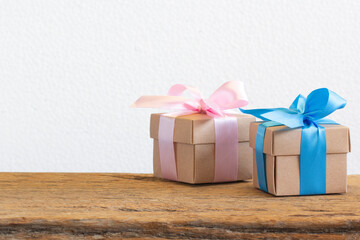 Brown gift box on wood table background