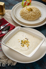 A traditional Syrian dish (Shakria with meat) made from yoghurt cooked with starch