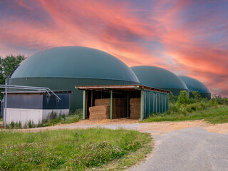 biogas production, biogas plant, bio power with sunset	
