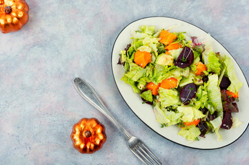 Salad with pumpkin and beets, space for text.