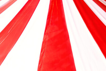Background of red and white stripes of circus cupola