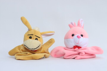 Soft hand puppet toy on a white background. Puppet show concept.