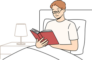 Man reads book before bedtime, sitting in bed at night and enjoying plot of fantasy novel