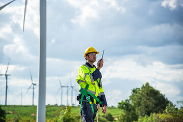 Wind turbine Engineer working in wind turbine farm , Generator station, renewable energy , Sustainable energy industry concept