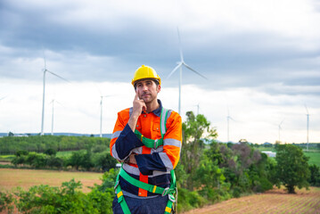 Wind turbine Engineer working in wind turbine farm , Generator station, renewable energy , Sustainable energy industry concept