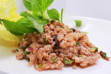Minced pork larb, Thai food with vegetables, medium distance shot