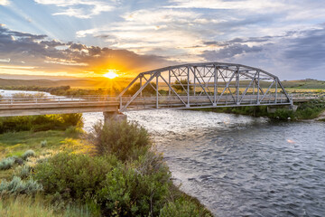 A Camelback Parker Through Truss Bridge, Warren Bridge across the Green River along the old highway roadbed, now Highway 191, Daniel, Wyoming - obrazy, fototapety, plakaty