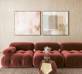 Abstract art above plush red sofas in chic interior