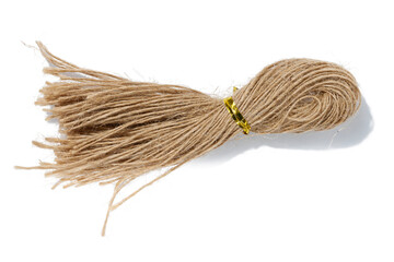 Brown twine rope on a white isolated background, top view. Packing natural
