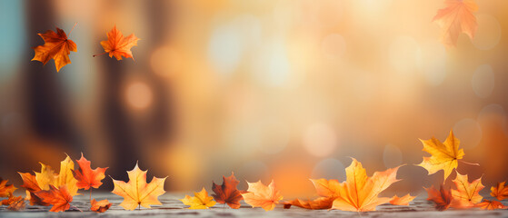 Naklejka na ściany i meble Colorful wide panoramic autumn background with orange leaves and blurred banner background