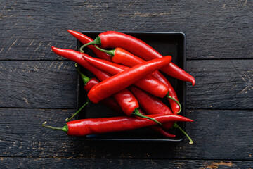 Red hot chili pepper composition, spicy organic paprika background