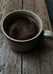 Wooden Table with Coffee Cup and Mug Indoors