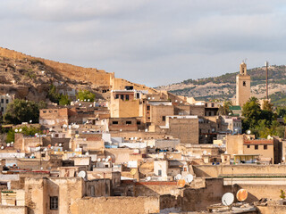 Fototapeta na wymiar Dense neighborhood in Fes, Moroco, seen from a rooftop on a cloudy afternoon