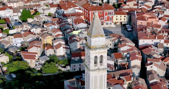 Drone video of the historic Croatian town of Voznjan in Istria with church bell tower