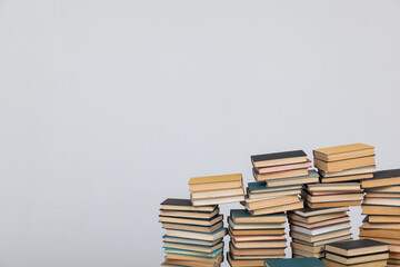 learning literacy science education stack of books on a green background