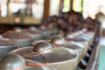 Gamelan. Indonesian Javanese musical instrument, close-up with selective focus. Musicology, ethnomusicology concept image