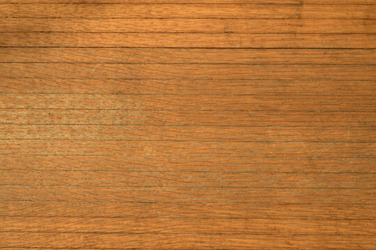 A photo of the texture of a high-quality wooden surface.Vintage wood countertops. Antique background with horizontal stripes