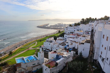 A panoramic view of the old city of Tangier with a view of the sea and the port